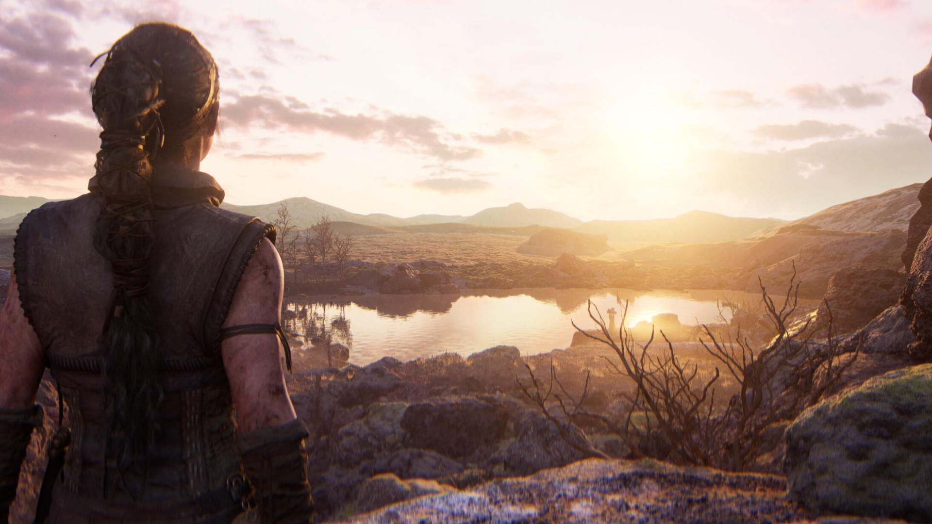 Senua en train de contempler le paysage dans Senua's Saga : Hellblade II